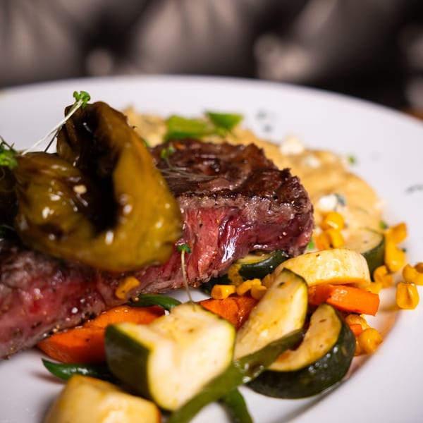 Grilled steak with roasted vegetables